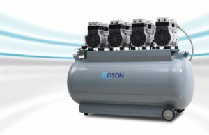 牙科空气压缩机，配有四个气缸盖，安装在带轮子的大型卧式灰罐上，专为牙科诊所设计