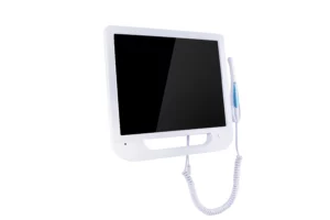 White dental intraoral camera monitor with black screen display and attached handpiece on flexible cord