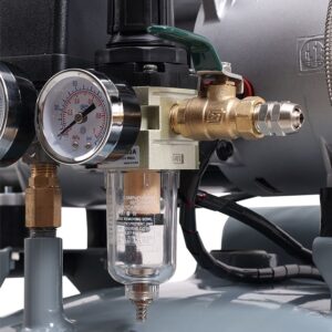 Close-up of a dental air compressor's pressure gauge, regulator, and moisture filter