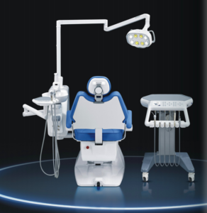 A front view of a blue and white dental chair with a large overhead light and a separate, wheeled instrument cart, on a black background