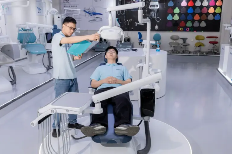 Dental chair demonstration in showroom setting showcasing innovation for dental practice