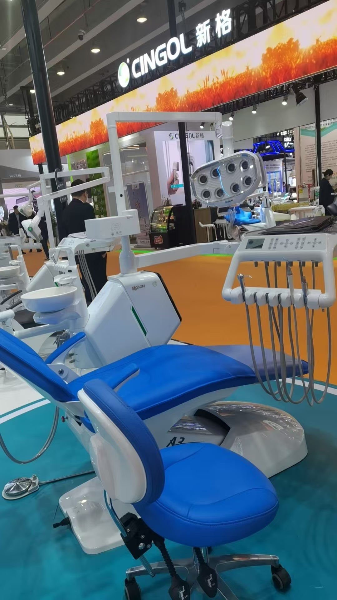 A close-up of a modern water dispenser, representing a source of pure water for a dental autoclave.